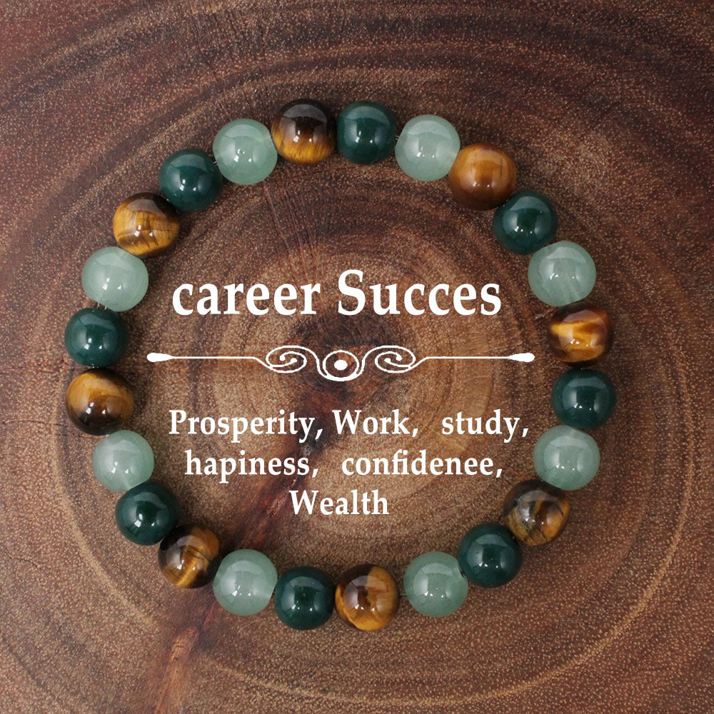 Natural tiger eye crystal stone bracelet with polished round beads alternating in warm golden-brown tiger eye, deep forest green stone and pale apple green crystal, hand-knotted on elastic cord, earthy crystal jewelry for women and men.