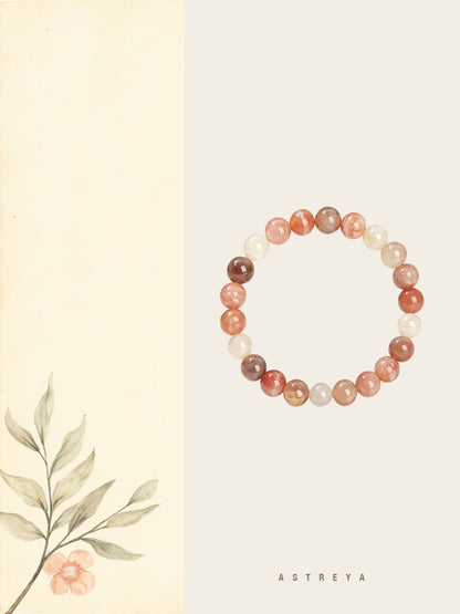Peach moonstone bracelet hand-strung from 6mm polished round beads, soft
wash of peach cream warm sand with iridescent inner glow, traditionally
paired with new beginnings and steady comfort, gift-ready crystal jewelry.