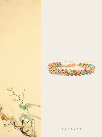 Multi-Color Gemstone Woven Bracelet hand-woven on golden cord with red, pink, amber, green, turquoise and ivory natural stone beads, adjustable pull-cord closure, vibrant crystal jewelry gift for women.