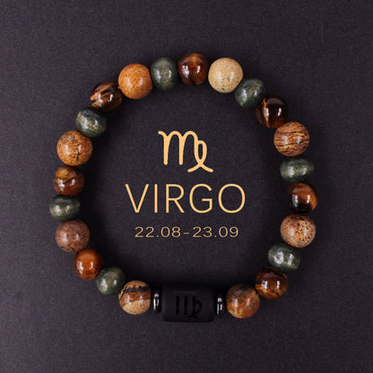 Macro detail of natural zodiac stone bracelet engraved obsidian zodiac symbol centerpiece alongside chatoyant tiger eye and silky hawk eye natural stones, polished finish, soft daylight.