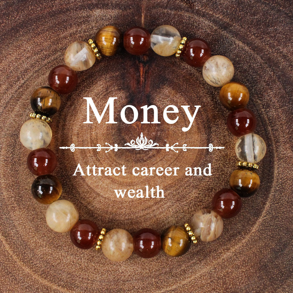 Close-up of natural tiger eye crystal stone bracelet showing polished round beads in three earthy tones with chatoyant golden-brown tiger eye, deep green stone and pale apple green translucent crystal surface, hand-knotted elastic structure.