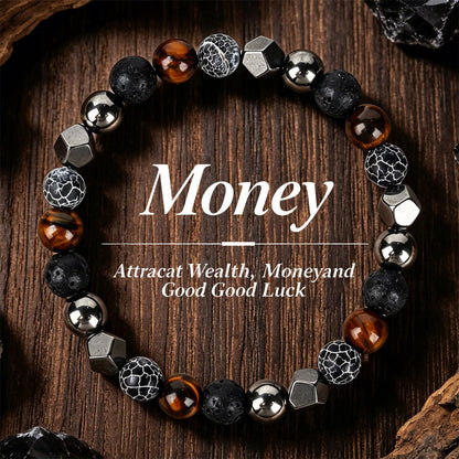 Natural lava tiger eye bracelet hand-strung in a single loop, alternating textured black lava stone with honey-brown tiger eye beads, displayed on dark wood