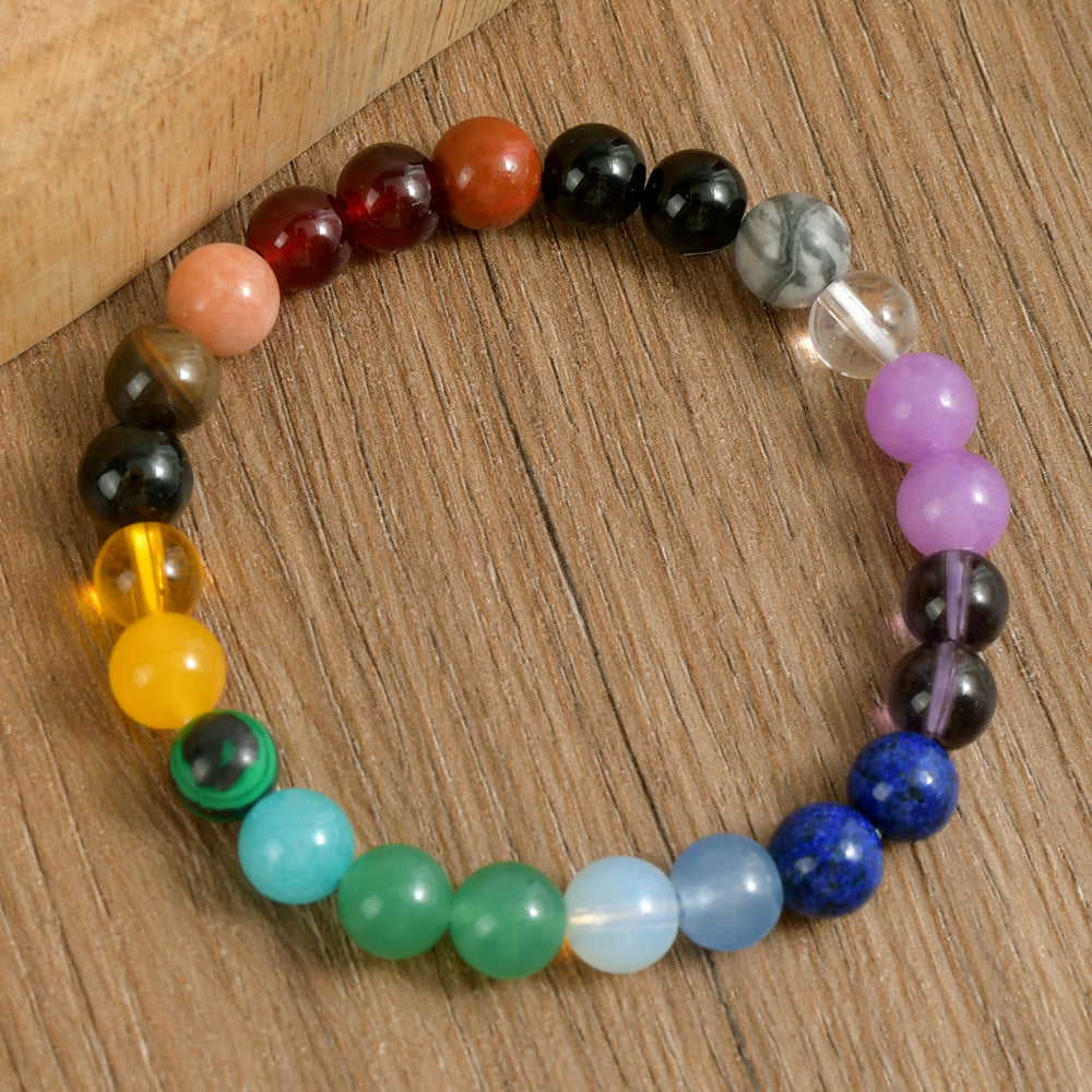 Close-up of Multi-Color Natural Crystal Stone Bracelet, focusing on the citrine, peach, cherry, smoky quartz and lilac bead cluster to show natural stone veining