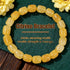 Natural Citrine Barrel Bead Bracelet on a deep green velvet surface, hand-strung with smooth polished golden-yellow citrine quartz in a rounded barrel shape 